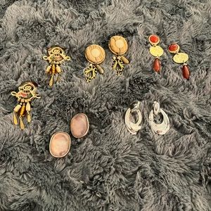 5 pair of fun, like new, clip on earrings.